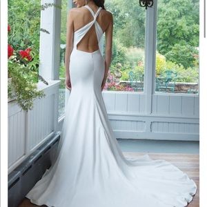 Brand new Justin Alexander wedding dress.